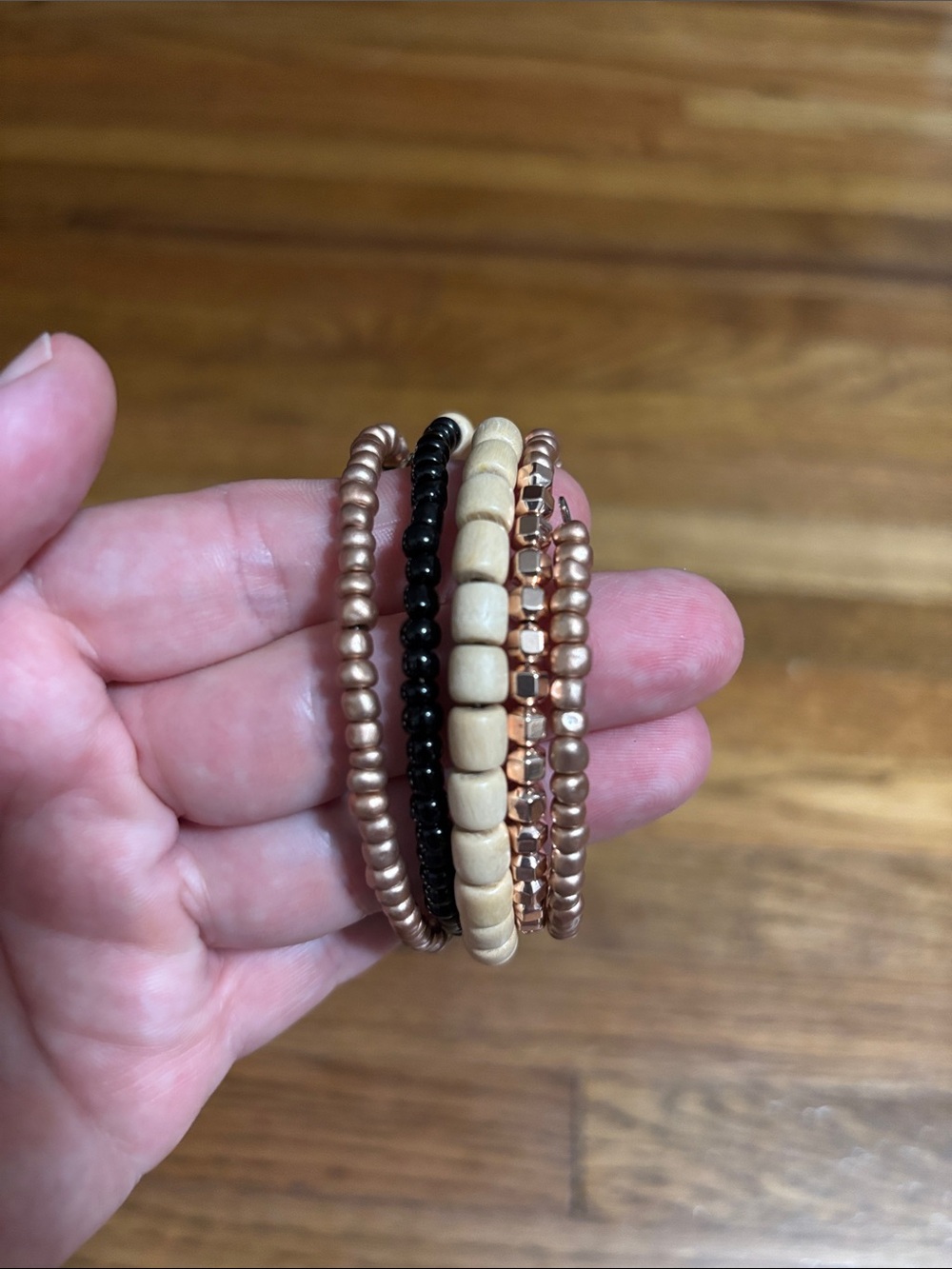 Spiral beaded bracelet black rose gold cream